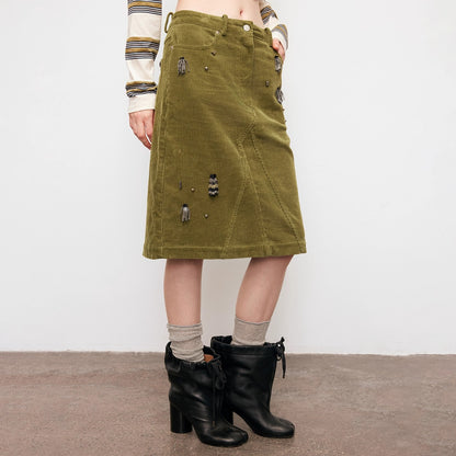 Dpercent | Corduroy skirt with handmade bead embellishments and back slit
