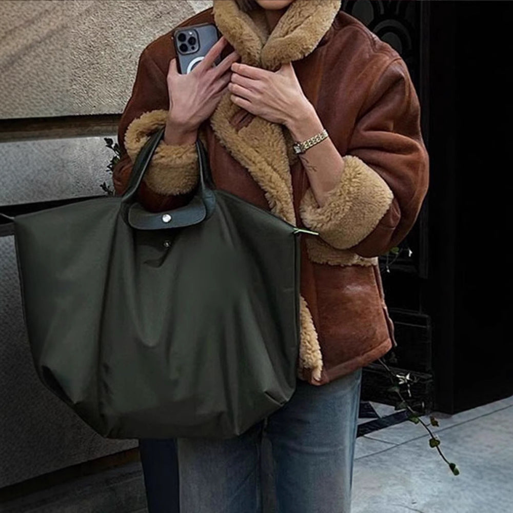 Featured image for 'Women's Lamb Wool Jacket Cozy & Stylish Loose-Fit Faux Fur Coat'
